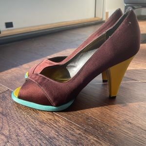 Brown satin heels with accents of teal and yellow